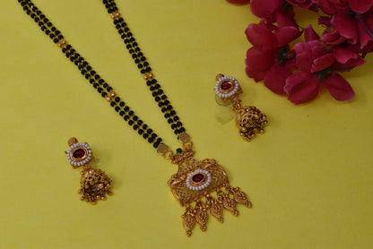 Golden and black beads chain with pendal