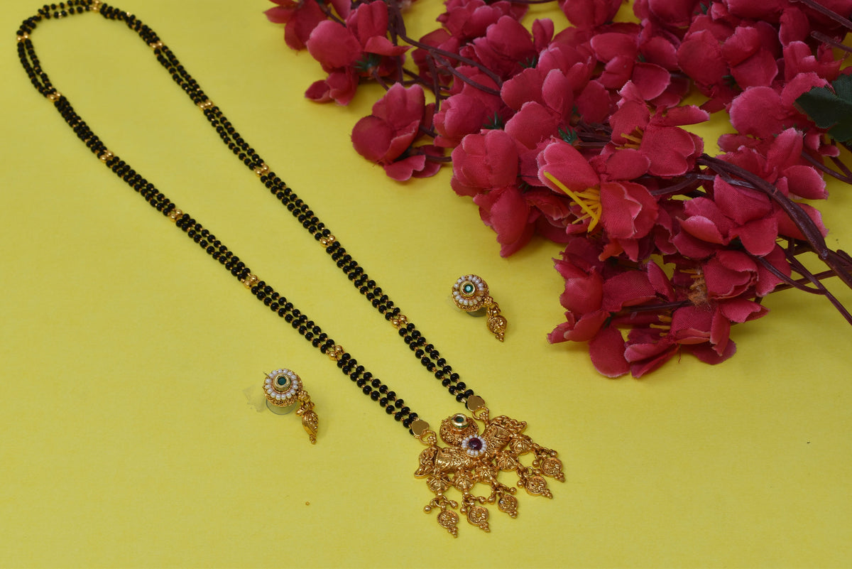 Golden and black beads chain with pendal