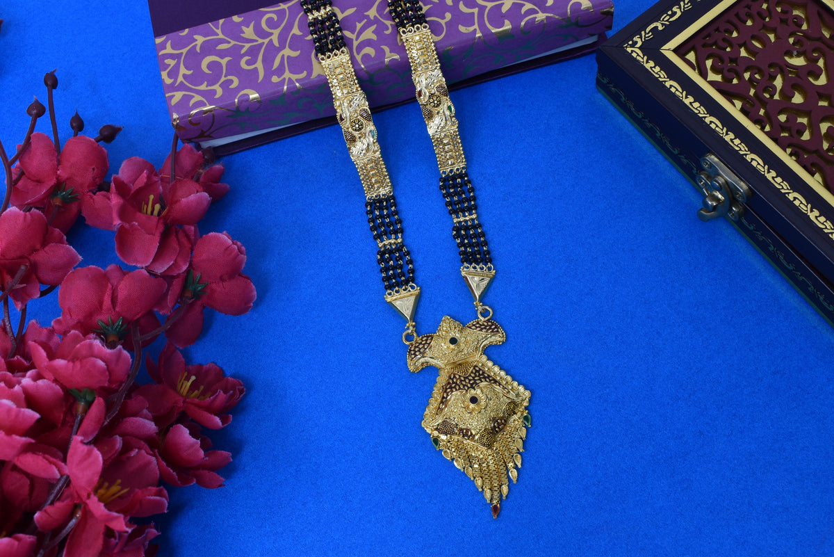 Golden and black beads chain with pendal