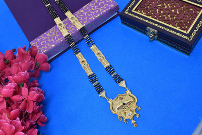 Golden and black beads chain with pendal